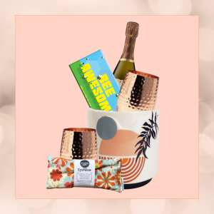 Relaxation Revival Kit in an eco-friendly plant pot, featuring a mini bottle of wine, copper stemless wineglass, premium chocolate, and a scented eye pillow, wrapped in sustainable materials."